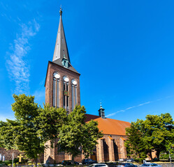 Wall Mural - XV century St. John the Baptist gothic church in historic old town quarter of Stargard in Poland