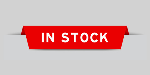 Sticker - Red color inserted label with word in stock on gray background