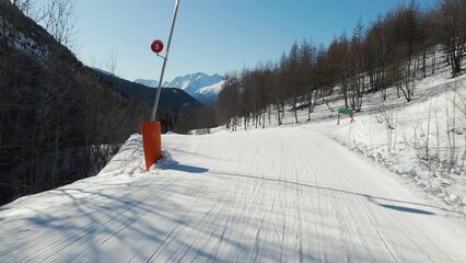 Wall Mural - Skiing down an easy slope slow