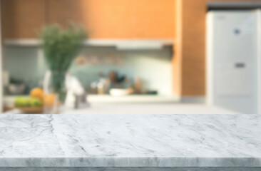 Wall Mural - Selective focus,Marble table top on blur white kitchen room background.