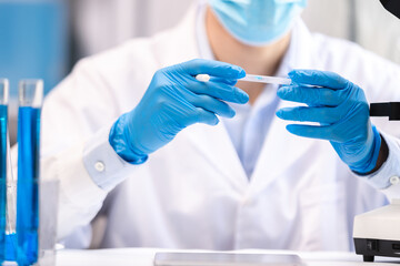 Wall Mural - health care researchers working in life science laboratory, medical science technology research work