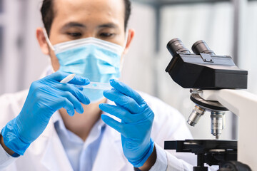 Wall Mural - health care researchers working in life science laboratory, medical science technology research work