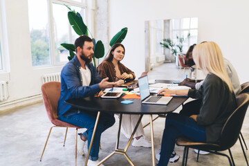 Sticker - Group of diverse people using gadgets in meeting room