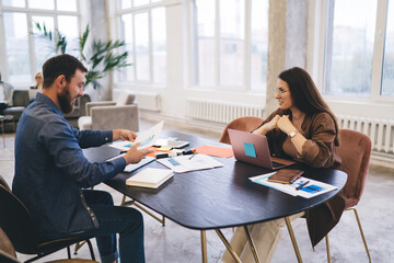 Sticker - Colleagues discussing on business project in office