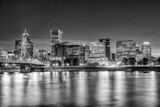 Fototapeta Nowy Jork - Modern night skyline of Portland with river light reflections