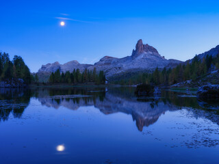 Poster - High mountains and reflection on the surface of the lake. Lago Federa, Dolomite Alps, Italy. Landscape at the night. Photo in high resolution.