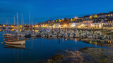 Fototapeta  - Night view on the harbor of Audierne, Brittany, France