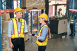 © Dearix - Caucasian man, woman warehouse supervisor discuss and use tablet check package with forklift driver worker load box on shelf, product distribution inventory management,Logistics shipping business plan
