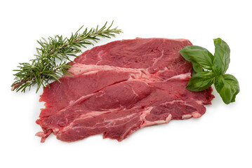 Wall Mural - Raw beef steak with rosemary and basil leaves isolated on white