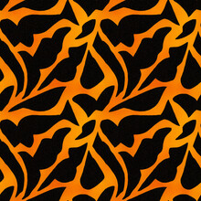 Tileable Seamless Orange Pattern On Black Leather Surface