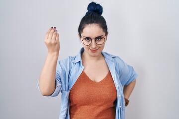 Sticker - Young modern girl with blue hair standing over white background doing italian gesture with hand and fingers confident expression