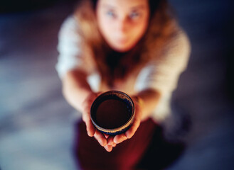 Sticker - Cacao ceremony, heart opening medicine. Ceremony space. Cacao cup in woman's hand.