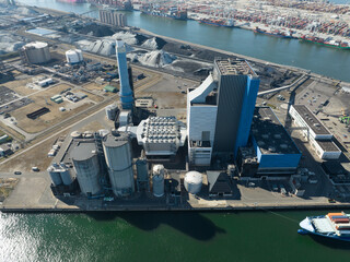 Coal power plant station energy electricity generation installation on the Maasvlakte in harbour port of Rotterdam. Climate change industrial emission pollution and emissions plant.