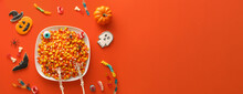 Different Halloween Sweets On Orange Background With Space For Text, Top View