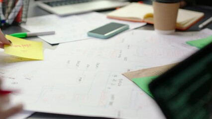 hands of programming and coding team planning cybersecurity strategy with technology chart and graph