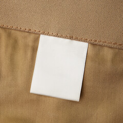 blank white color clothing label on brown t shirt