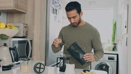 Wall Mural - Breakfast, relax and coffee with man in kitchen, happy and content while preparing drink in his home. Wellness, coffee machine and asian male relaxing in the morning with a strong, caffeine beverage