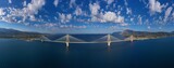Aerial drone ultra wide panoramic photo of state of the art latest technology cable strait steel suspension bridge crossing the sea