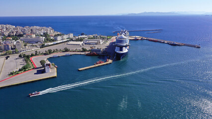 Wall Mural - Aerial drone photo of famous and busy port of Piraeus where passenger ferries travel to Aegean destination islands, Attica, Greece