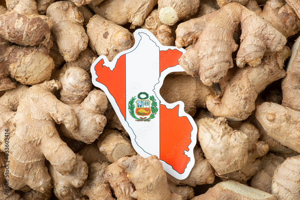 Flag of Peru on ginger roots background. Origin of ginger is Peru ...