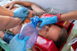 © zinkevych - Expert paramedics carrying out CPR on the unconscious man