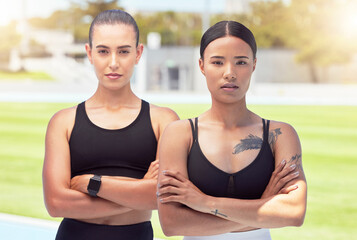 Canvas Print - Women, athlete and focus at training ground or running club together. Confidence, arms crossed and girl teamwork at sports field or fitness facility to prepare for competition or contest