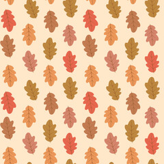 Wall Mural - Cute colorful oak leaves seamless pattern in orange, green , red and brown on light cream background. For autumn posters, textile, fabric and home décor 