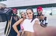 © oneinchpunch - Group of hip hop dancers taking a break and shooting selfies
