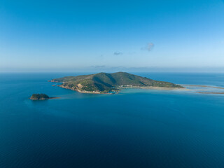 Wall Mural - Stunning aerial drone view of Hayman Island, the most northerly of the Whitsunday Islands in Queensland, Australia, near the Great Barrier Reef. Popular tourist destination with a resort hotel.