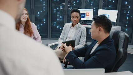Wall Mural - close up happy people on business meeting in data center. multi-ethnic experienced staff of it worke