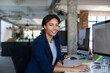 © ReeldealHD images - Portrait of African American businesswoman sitting at desk in an office