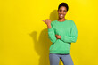 © deagreez - Photo of cute beautiful short hair person dressed casual pullover pointing thumb empty space isolated yellow color background