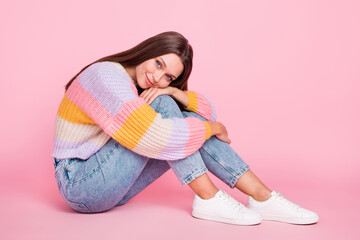 Poster - Full body profile portrait of lovely cute lady sit floor hands hold legs isolated on pink color background