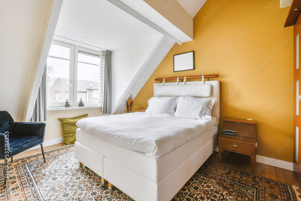 Bedroom interior with bed near window Stock Photo | Adobe Stock