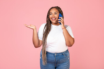 Wall Mural - African American Lady Talking On Cellphone Communicating Over Pink Background