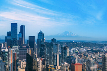 Wall Mural - Panoramic Seattle financial district skyline in city downtown with Mount Rainier in the background.