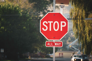 Urban stop sign in early morning