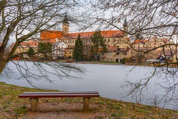 Wall Mural - Telc , beautiful  old town , buildings along the river during winter morning : Telc , Czech  : December 14, 2019