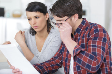 Wall Mural - a family discussing family finances