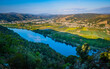 View on the Rhone river and its valley full of vineyards from the Pierre Aiguille in Tain l'hermitage (Drome, France)