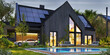 Night view of a beautiful modern houses with photovoltaic solar panels on the roof and electric vehicle