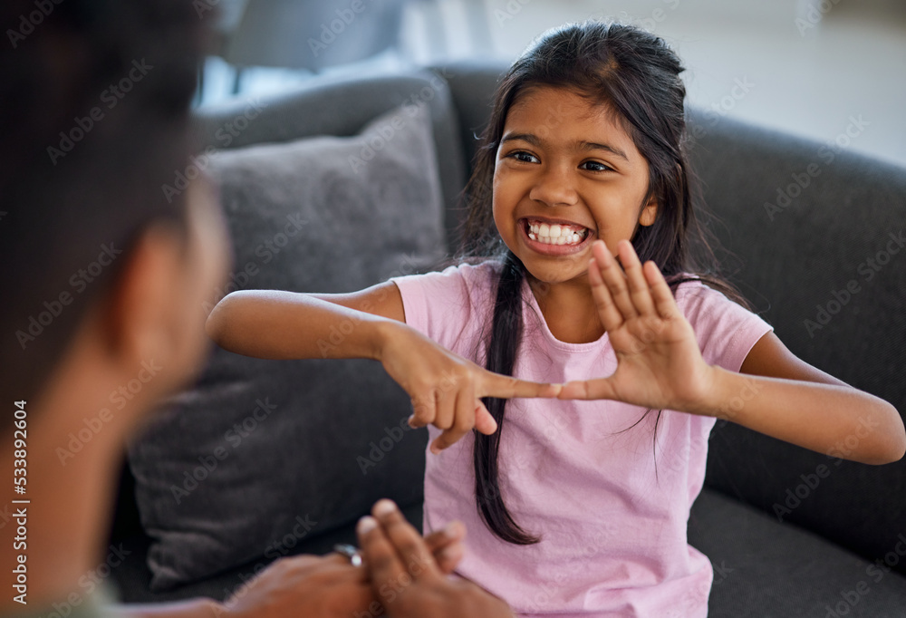 Fotografie Child, sign language and learning to communicate with deaf ...