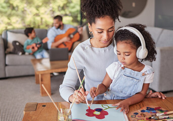 art, love and happy family bonding in living room doing fun activity and relax together in their hom