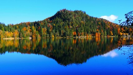 Poster - Autumn at the lake with clouds and mountains