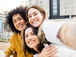 © gonzagon - POV of three diverse friends taking a selfie having a good time. Having fun