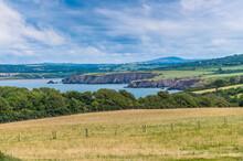 A View Along The Coastline In North Pembrokeshire, Wales On A Summers Evening