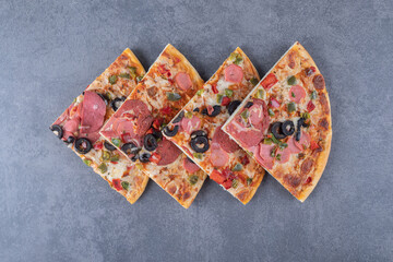 Wall Mural - Top view of stack pepperoni pizza slices