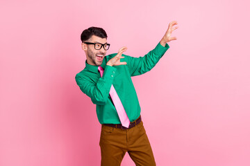 Canvas Print - Photo of impressed funky man dressed green shirt eyewear dancing showing arms claws isolated pink color background