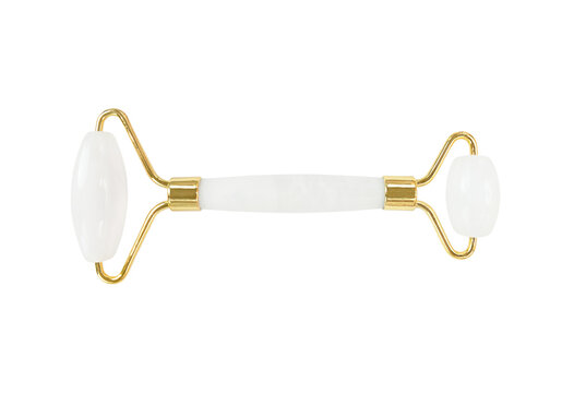 Face massage roller with quartz stone isolated on a transparent background.