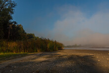 Mlynsky pond in autumn foggy morning near Lednice town